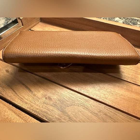 Michael Kors wallet brand new never used. Brown with gold accents. $148 new. - Picture 12 of 14